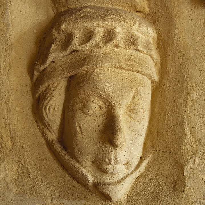A carved stone head at Christchurch Priory, Dorset, believed to be a portrait of Countess Isabella