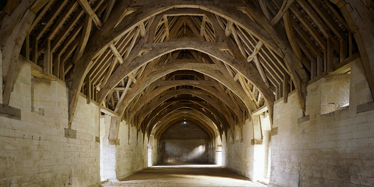 The original 14th century roof frame inside the tithe barn
