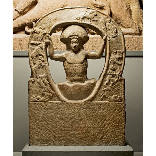 Stone relief from Housesteads Roman Fort showing the birth of the god Mithras from an egg - the symbol of eternal time