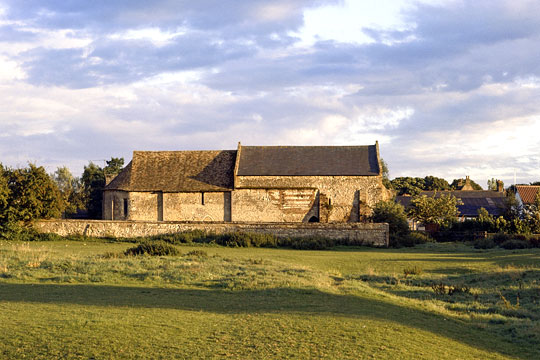 Exterior view across fields of Isleham Priory Church
