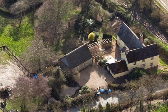 Aerial view of St James's chapel, with neighbouring cottage