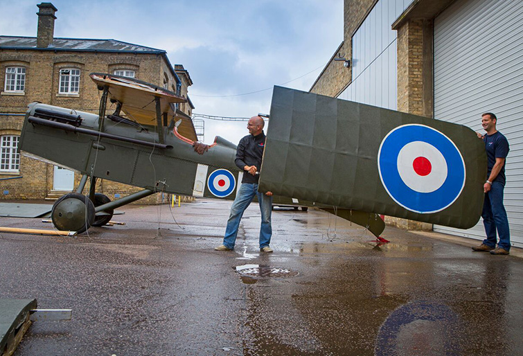 staff-members-disassmble-a-full-scale-Bi-Plane-to-be-transported-to-one-of-English-Heritages-summer-events.jpg