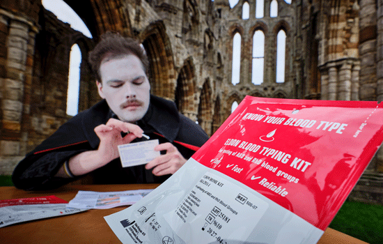 Image: an actor dressed as Dracula tests his blood type at Whitby Abbey Image: an actor dressed as Dracula tests his blood type at Whitby Abbey