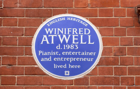 A view of a blue plaque which reads: Winifred Atwell d.1983 Pianist, entertainer and entrepreneur A view of a blue plaque which reads: Winifred Atwell d.1983 Pianist, entertainer and entrepreneur
