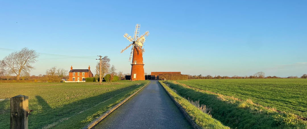 Image: a view of the newly restored Sibsey Trader Mill in the surrounding landscape Image: a view of the newly restored Sibsey Trader Mill in the surrounding landscape