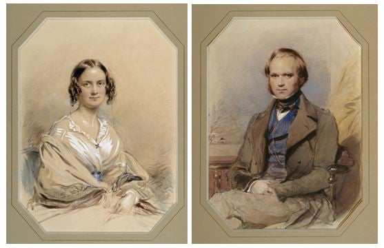 Matching portraits of Emma and Charles Darwin at the time of their marriage in 1839. Emma is on the left with ringlets in her hair and wearing a white dress and beige shawl. Charles is on the right with light brown hair and no beard, wearing a brown coat, blue waistcoat and light brown trousers. 