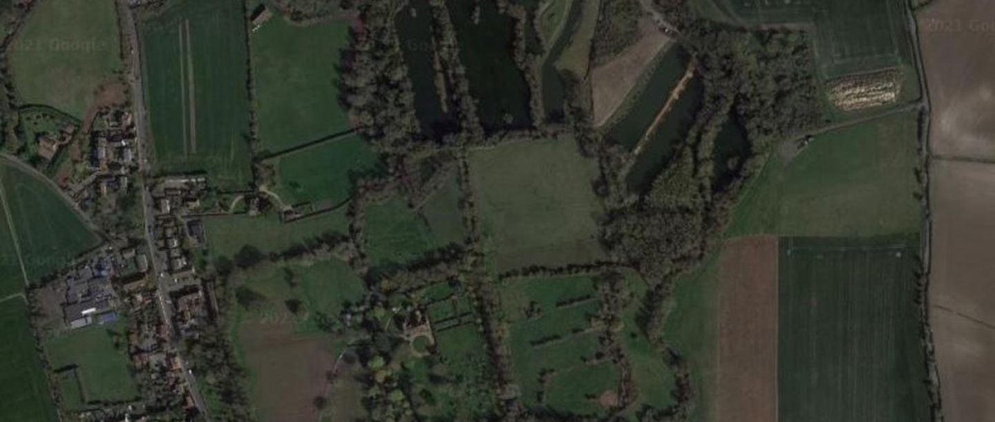 An aerial view of the fields around the site of Darenth Villa.