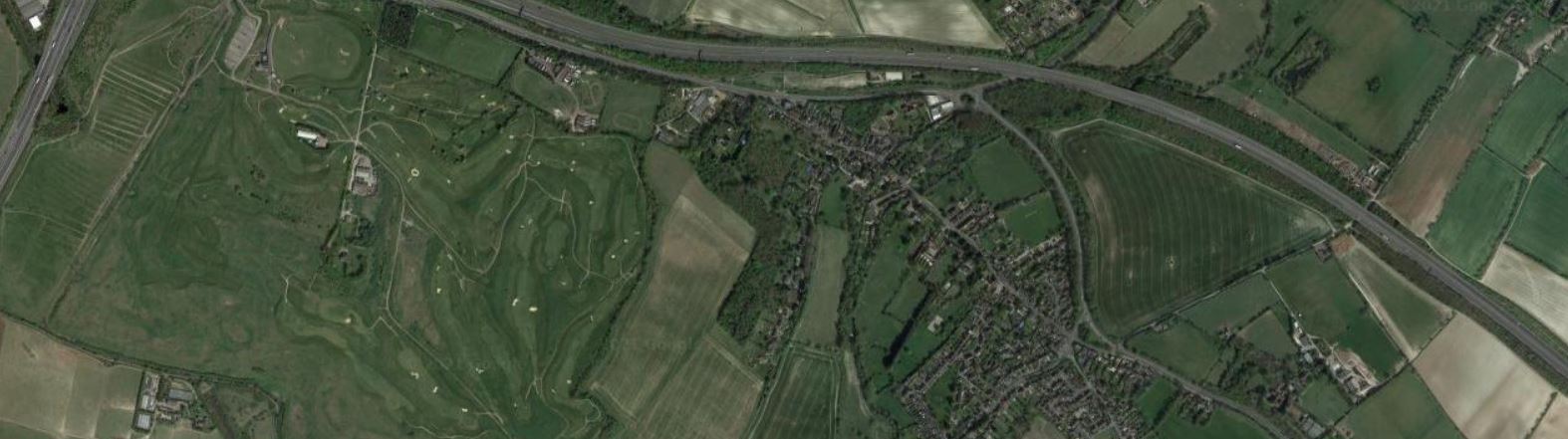 An aerial view of Farningham showing roads, village buildings and fields around the village.