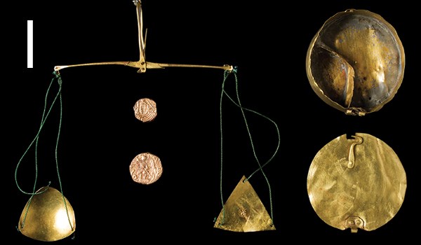 Merchant's scales from Roche Abbey: these miniature scales were found in Roche Abbey's drain in their circular carrying box, along with tiny weights.