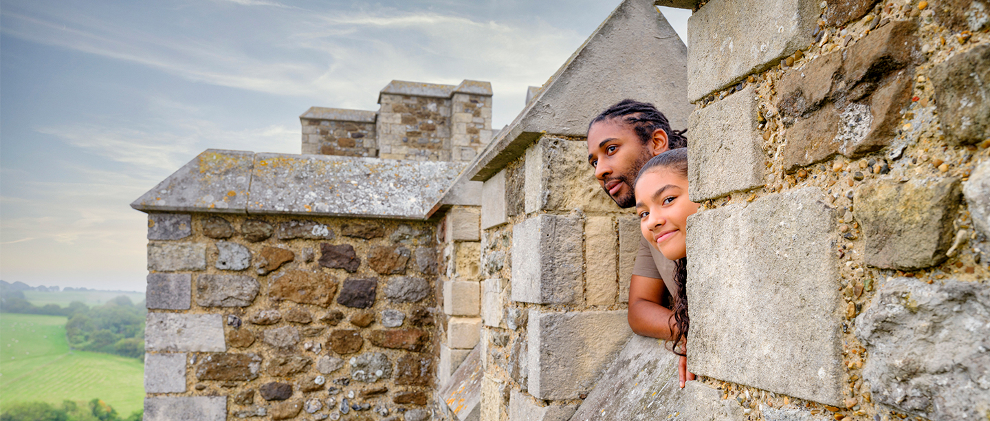 Image: father and daughter looking out from Dover Castle