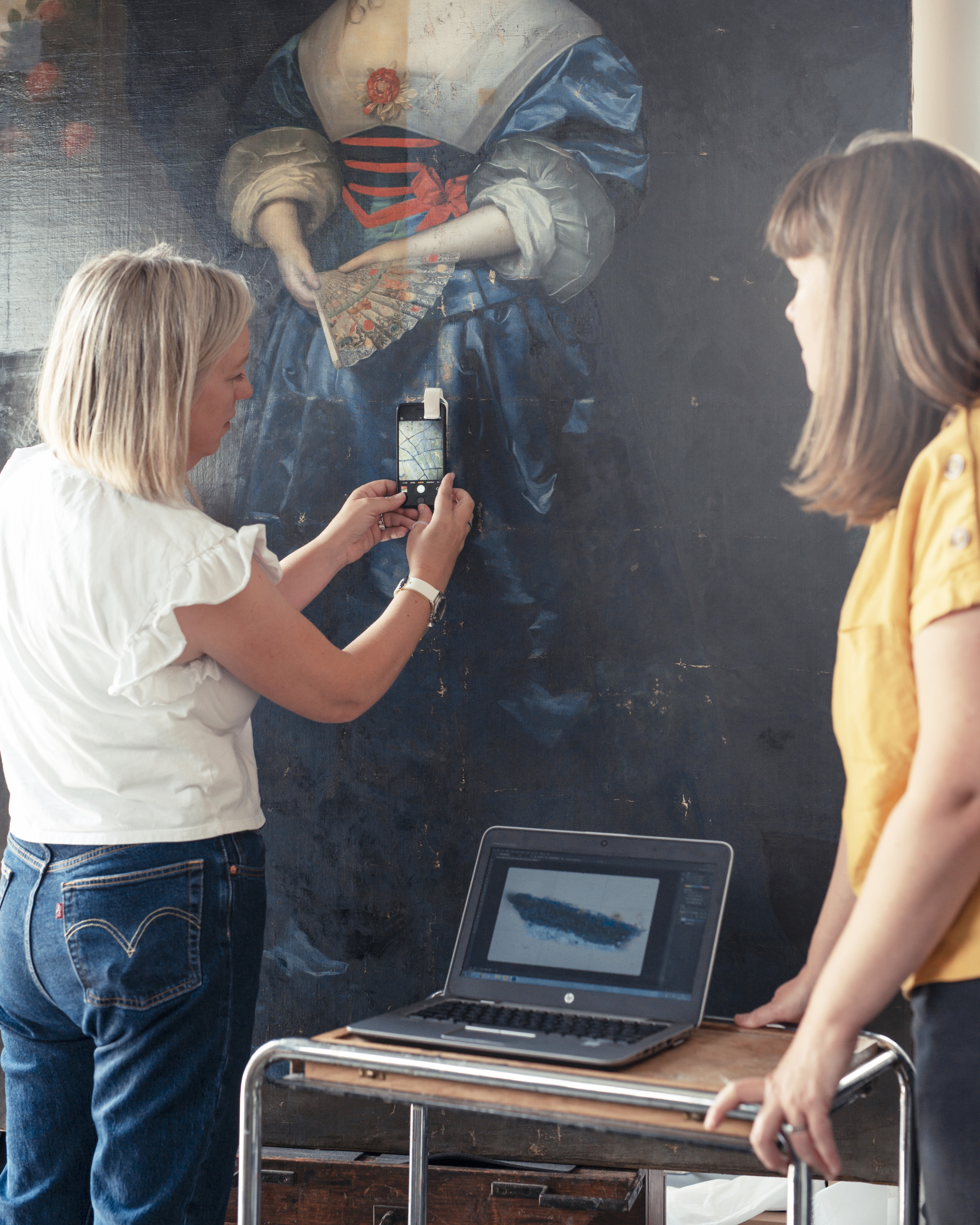 Image: Looking at tiny samples of a painting