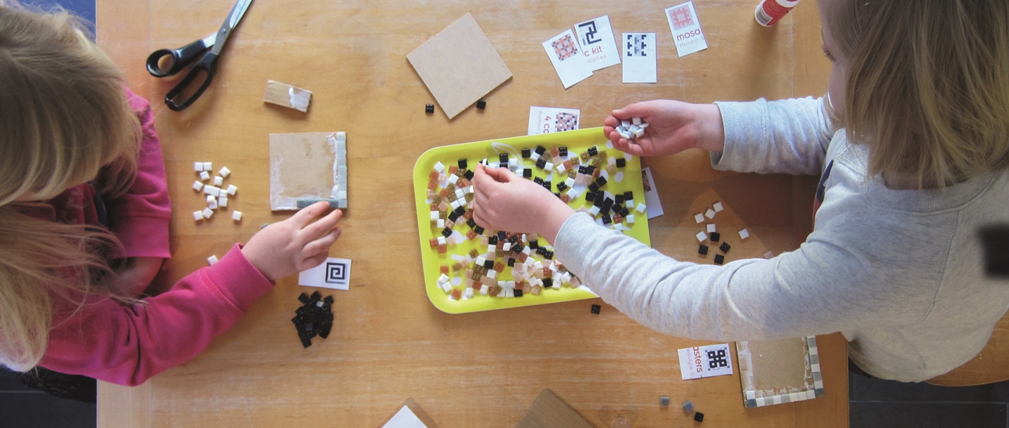Children making Roman mosaic