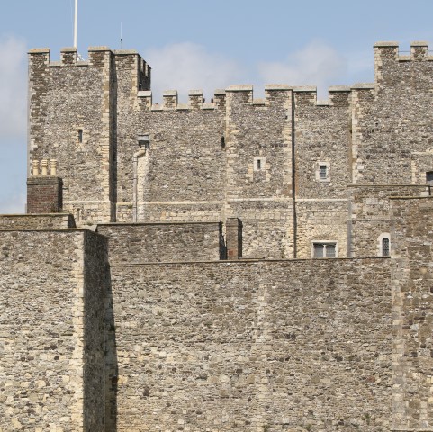 Image: Exterior photo of the outer walls and keep of Dover Castle in Kent
