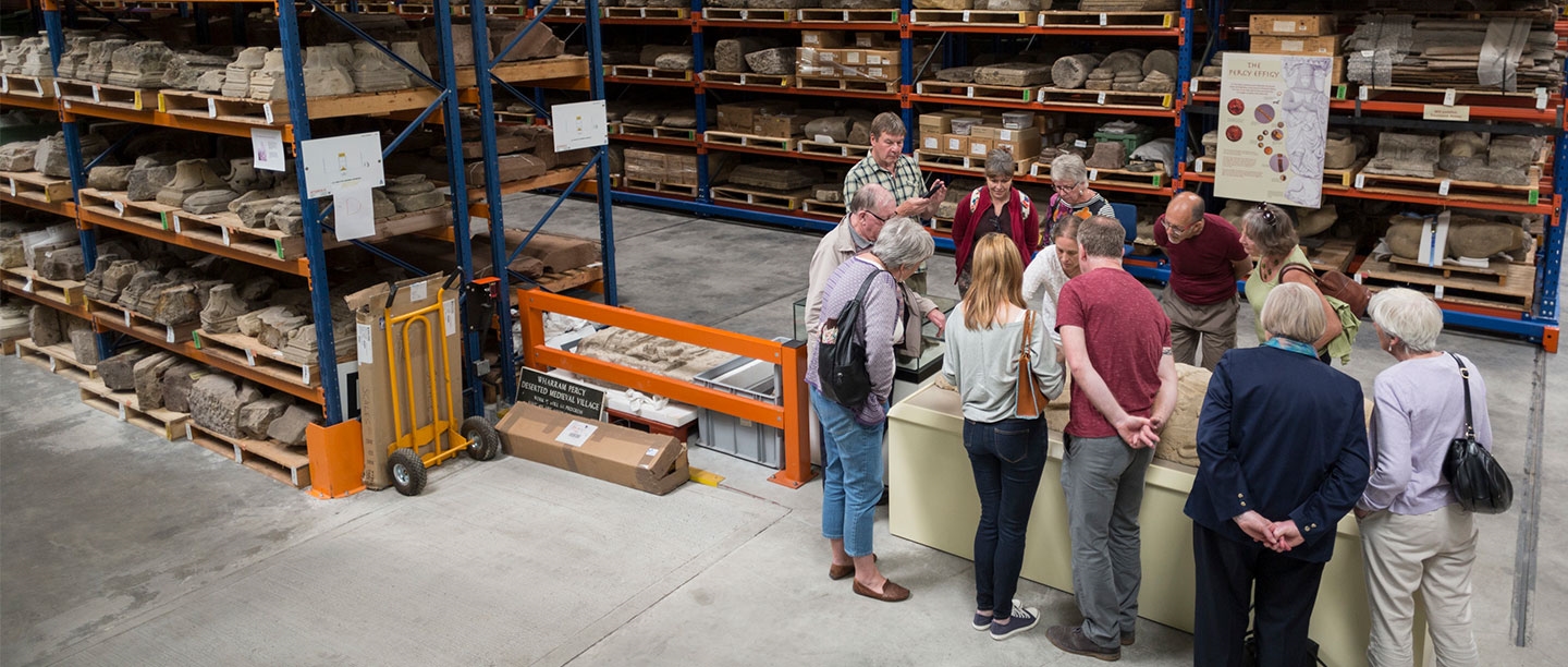 Image: Members enjoy a tour of an archaeology store