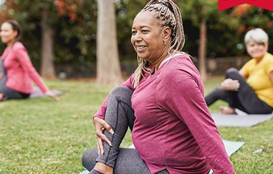 Image: woman holds yoga pose