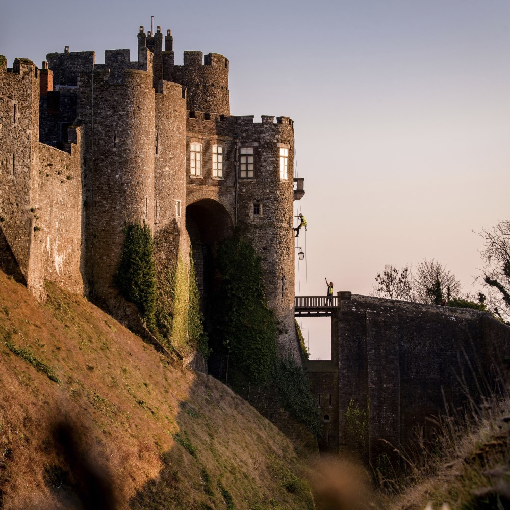Photo of Constable's Tower at Dover Castle with the sun low in the sky