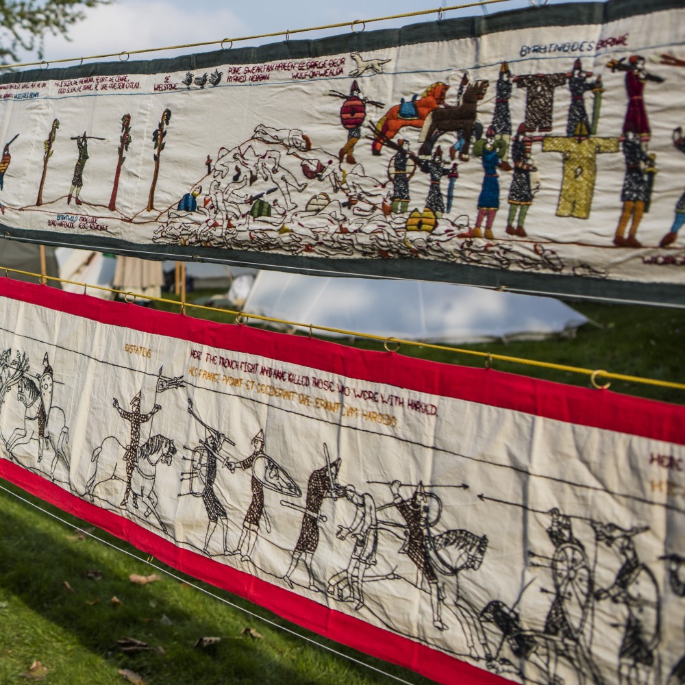 Photo of a copy of the Bayeux Tapestry at Battle Abbey