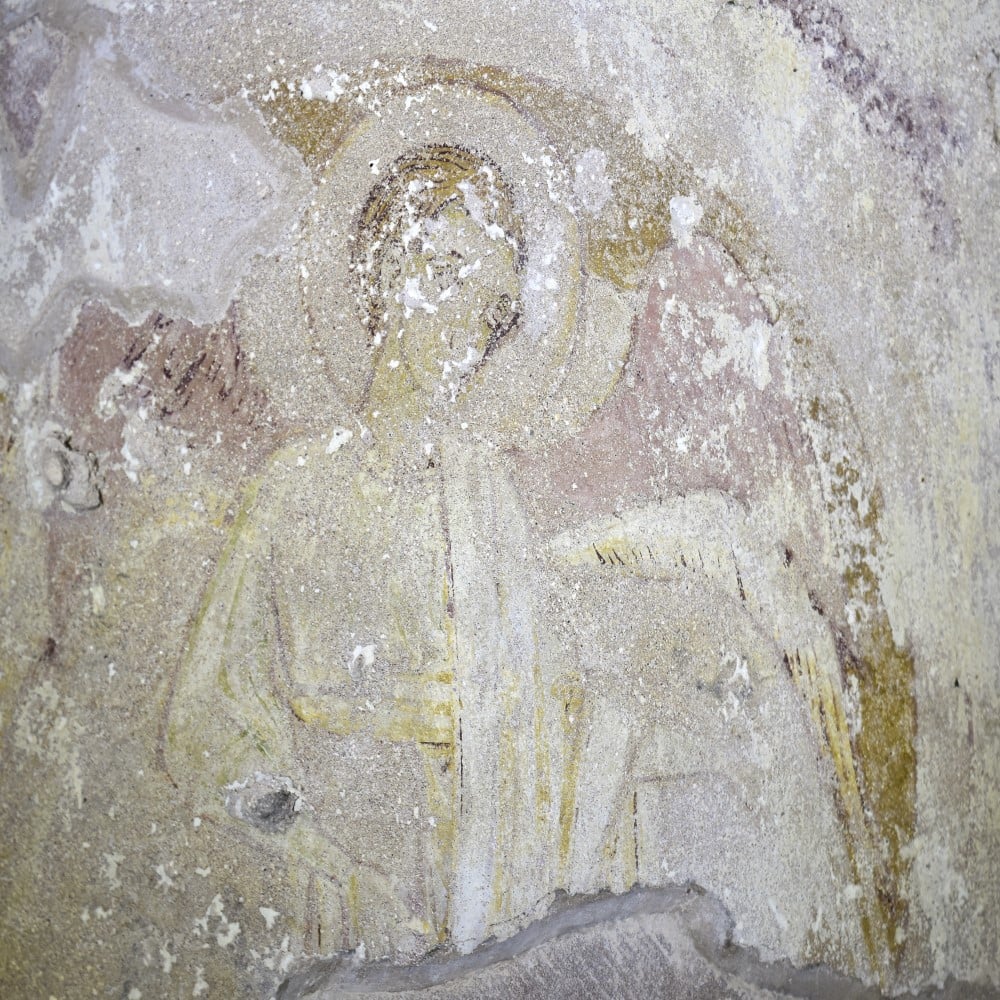 Photo of a wall painting of an angel in the chapel of St Mary de Castro at Chester Castle