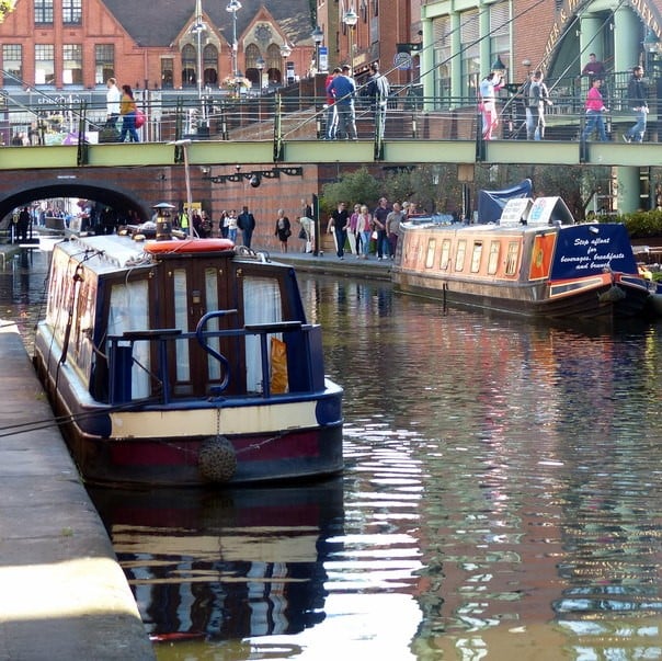 Photo of canal boats on the river in Birmingham on a sunny day