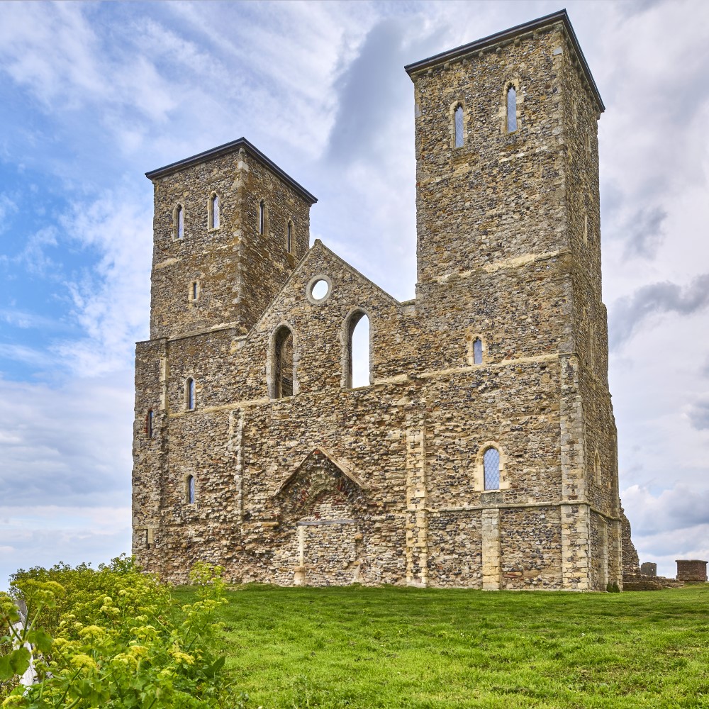 Photo of the front of Reculver Towers on a cloudy day