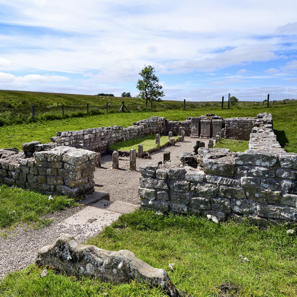 Photo of the remains of the Temple of Mithras at Carrawburgh Roman Fort on Hadrian's Wall