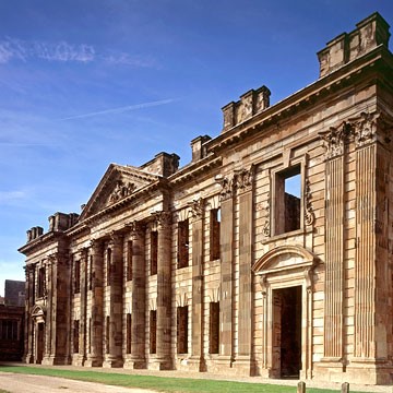 Photo of the front of the remains of Sutton Scarsdale Hall on a sunny day