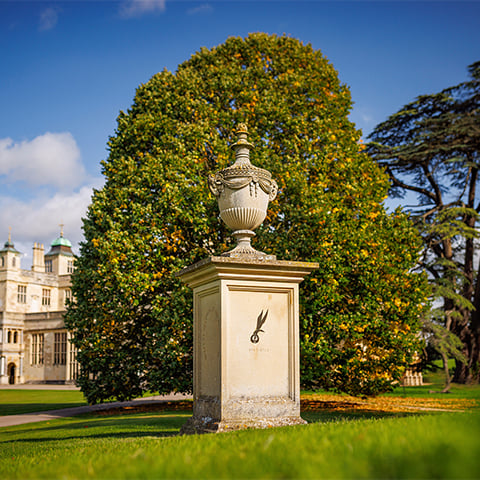 Image: The south face of the Polish War Memorial at Audley End House, bearing the insignia of the Polish Air Force
