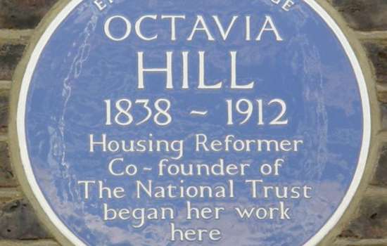 Photo of the blue plaque to Octavia Hill, housing reformer and co-founder of the National Trust
