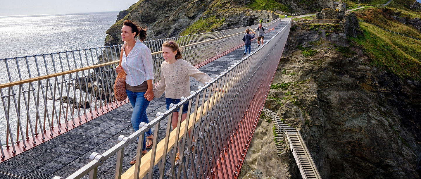 Image: Family on the bridge at Tintagel Castle