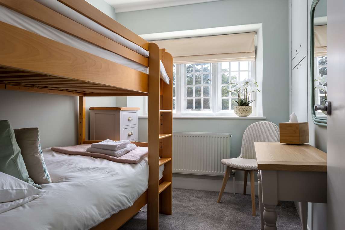 Twin bedroom with bunk beds, first floor Twin bedroom with bunk beds, first floor