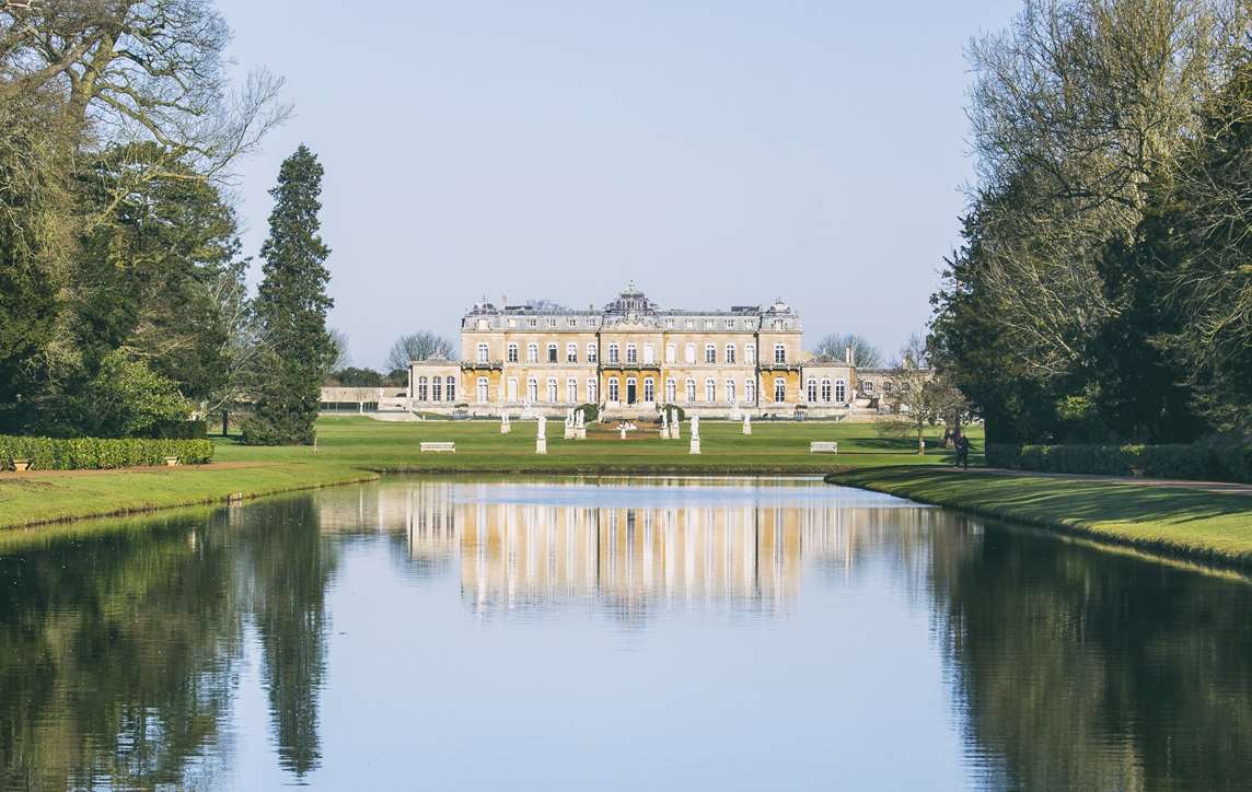 Image: A building and trees reflected in the Long Water at Wrest Park 