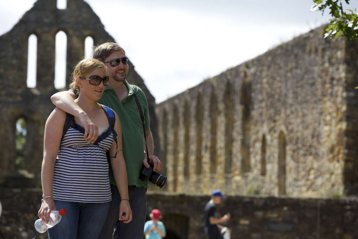 Image: Two people at Battle Abbey Image: Two people at Battle Abbey