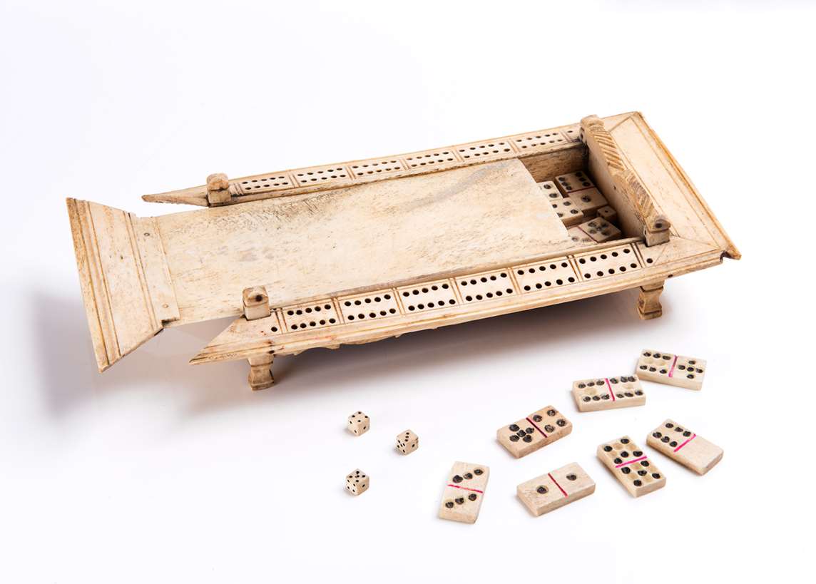 Gaming board carved from bone made by a prisoner
