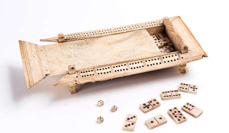 Gaming board carved from bone made by a prisoner Gaming board carved from bone made by a prisoner
