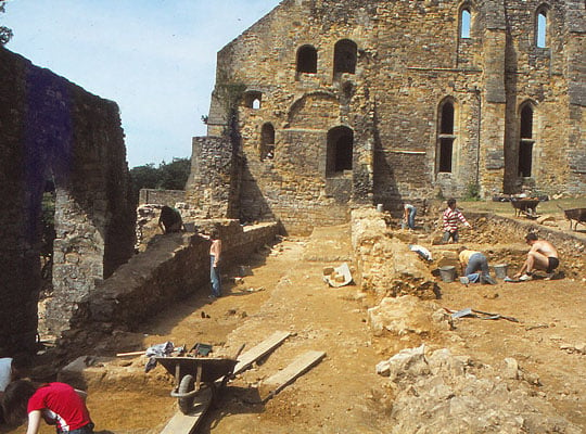 Photograph showing excavation of the monastic latrine in 1979