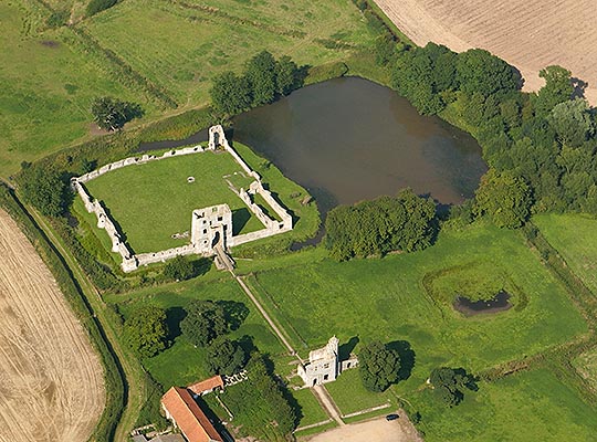 Aerial view of Baconsthorpe Castle, showing the remains of the outer gatehouse and inner castle Aerial view of Baconsthorpe Castle, showing the remains of the outer gatehouse and inner castle