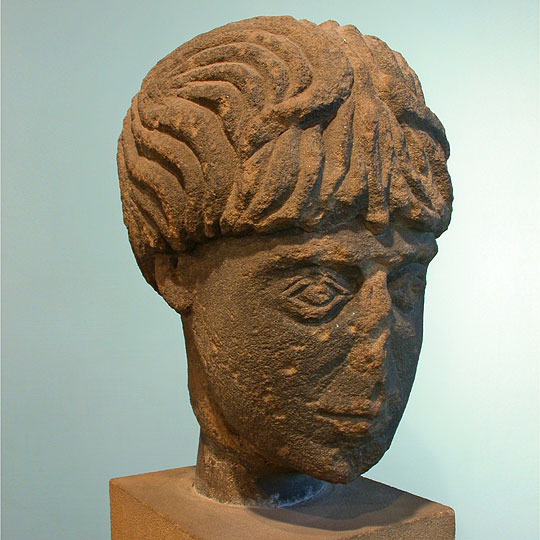 Carved stone head of Antenociticus, found in the temple at Benwell