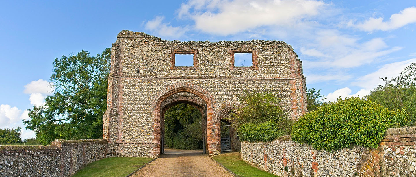 A dramatic archway among the ruins at Castle Acre Priory