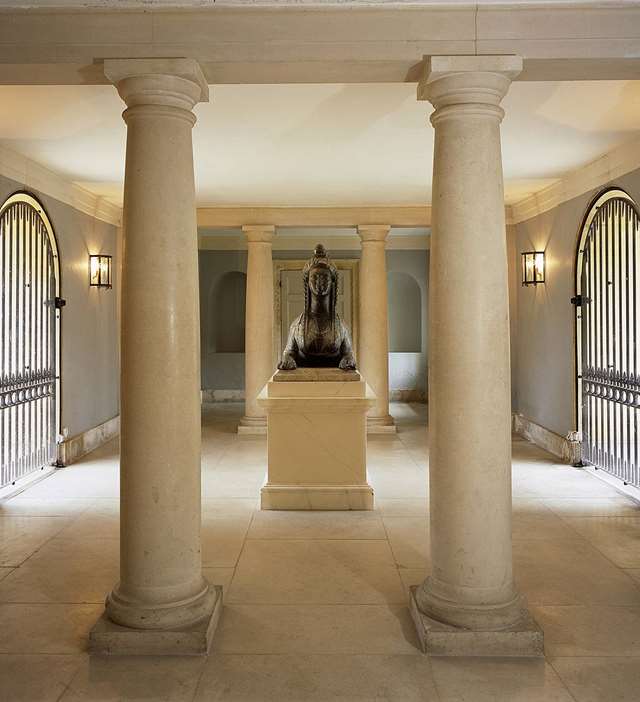 The ground floor of the link building, added in about 1732 to connect the old house with the new villa. The lead sphinx  was made by John Cheere (1709–87)