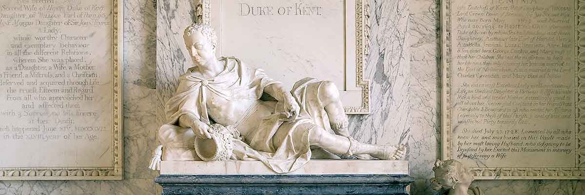 Detail of the monument to the Duke of Kent and his two wives in the De Grey Mausoleum, by the celebrated Flemish sculptor John Michael Rysbrack (1694–1770) Detail of the monument to the Duke of Kent and his two wives in the De Grey Mausoleum, by the celebrated Flemish sculptor John Michael Rysbrack (1694–1770)