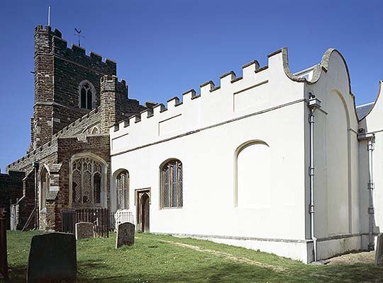 The exterior of the De Grey Mausoleum. The crenellated parapets were designed to harmonise with the architecture of the 15th-century church