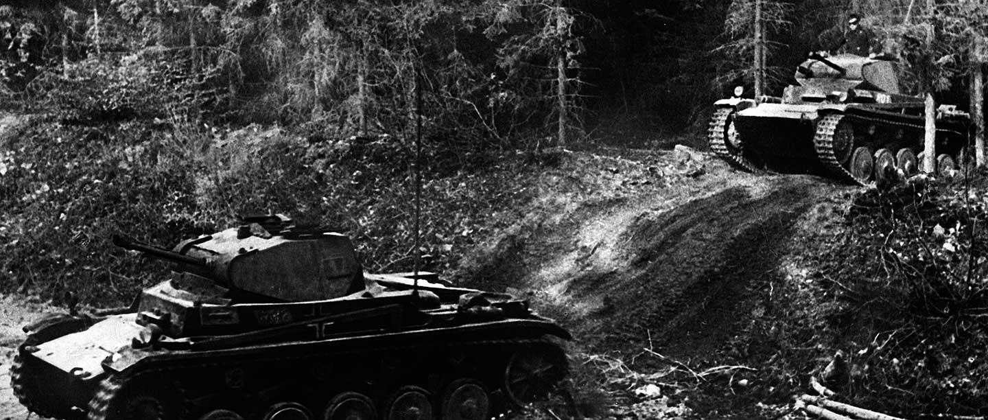 German tanks advancing through difficult terrain in the Belgian Ardennes, May 1940
