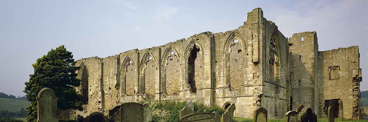 The refectory, showing the impressive remains of the Decorated style windows The refectory, showing the impressive remains of the Decorated style windows