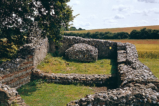 The east end of the medieval chapel, which made use of the surviving Roman walls (identified by alternating layers of grey stone and red tile) The east end of the medieval chapel, which made use of the surviving Roman walls (identified by alternating layers of grey stone and red tile)