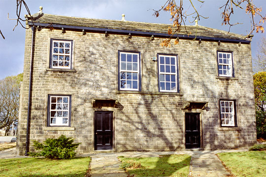 The exterior of the chapel with the apperance of a semi-detached house