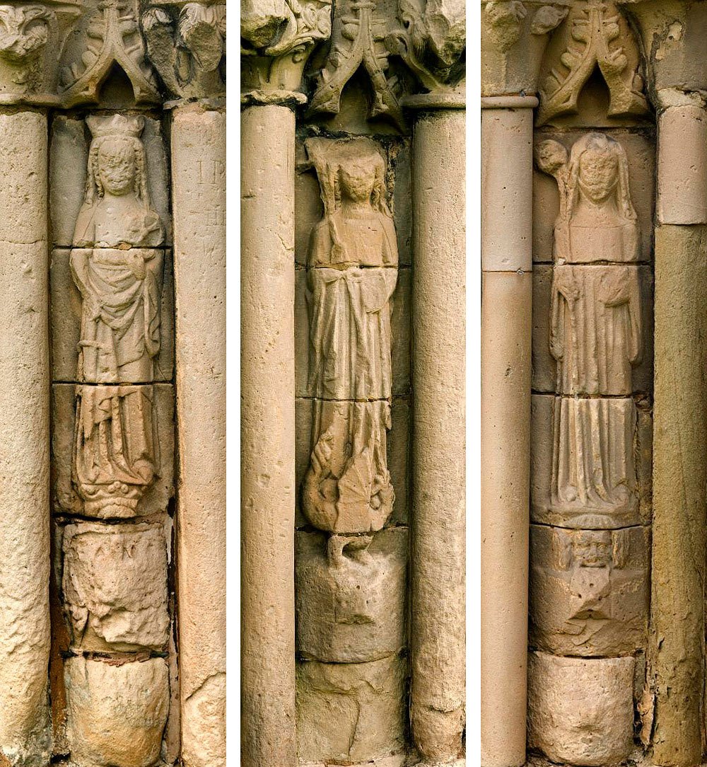 The statues of the three female saints on the chapter house façade: (from left) St Catherine of Alexandria, St Margaret of Antioch and St Winefride