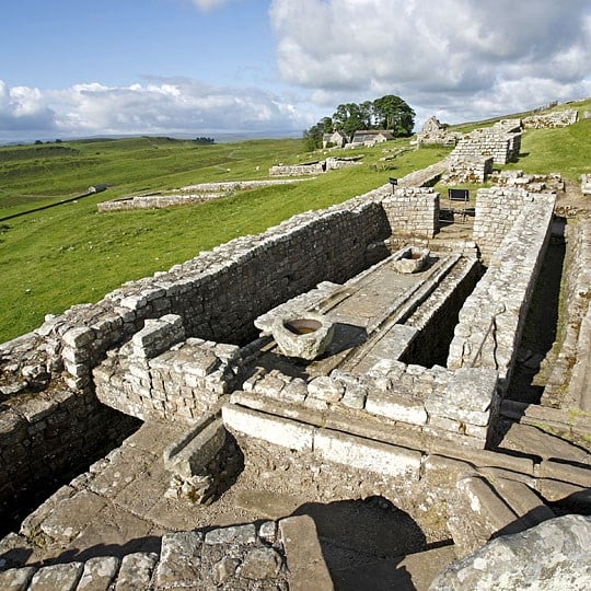 Extensive and detailed remains of the latrines at Housesteads Roman Fort