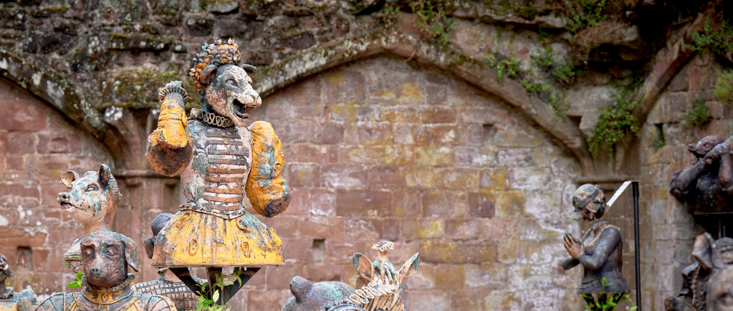A sculpture of a lioness wearing an Elizabethan dress
