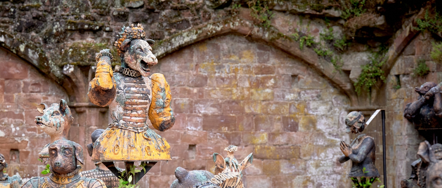 A sculpture of a lioness wearing an Elizabethan dress