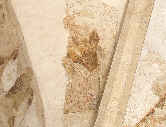 An angel playing a psaltery, a stringed instrument popular in the Middle Ages and still used in the Near East, painted on the north quarter of the vault at Longthorpe Tower